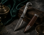 Hand-engraved scrollwork across the silver blade of the SENVIRRA Eagle Katar