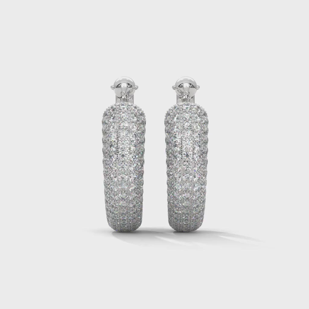 Pavé Huggie Hoop Earrings rotating product video in silver