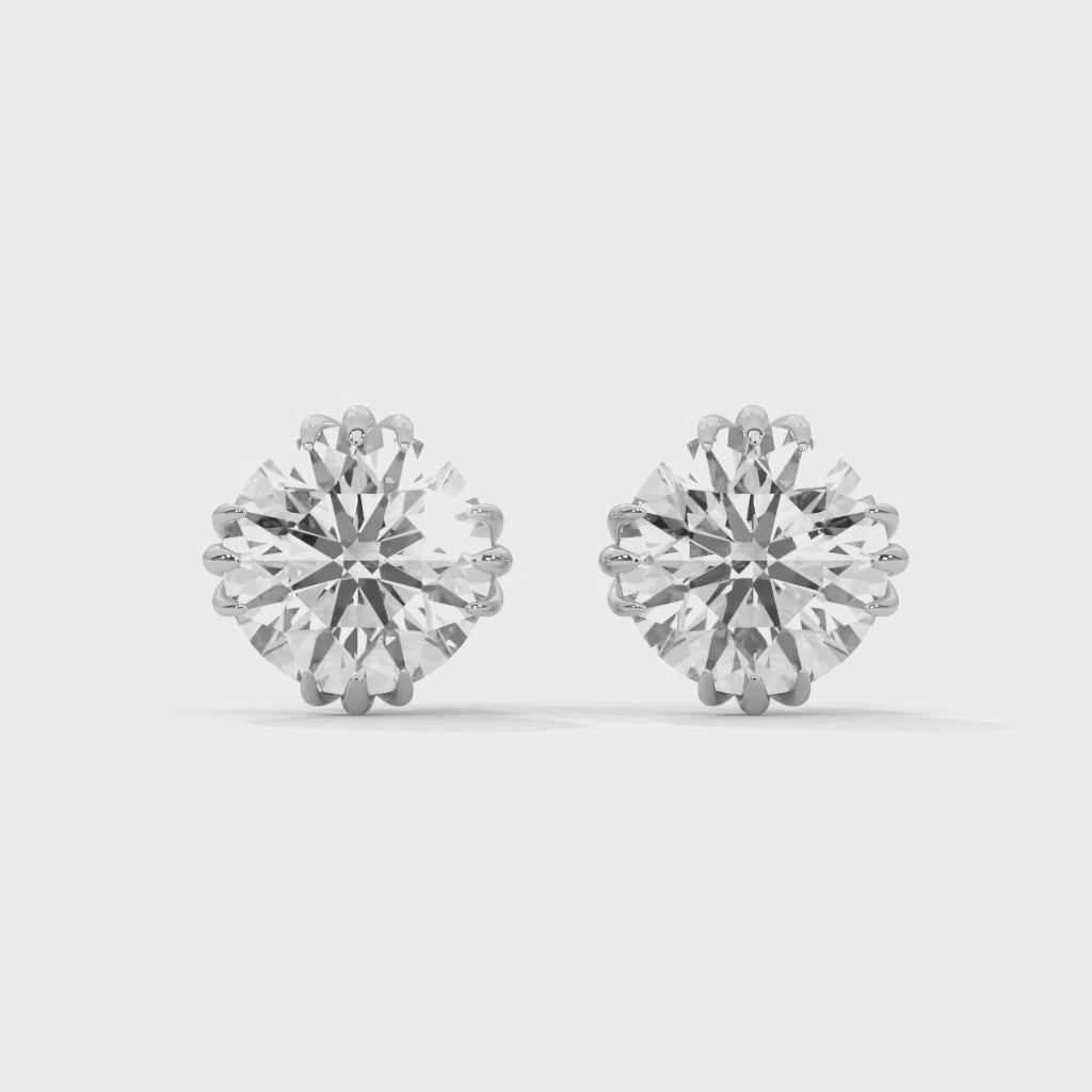 Round Solitaire Stud Earrings rotating product video in silver