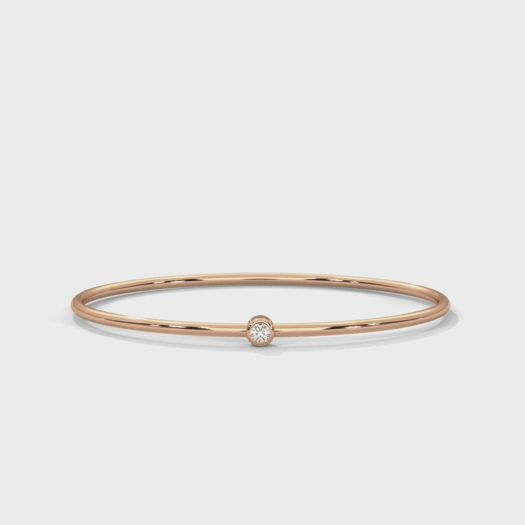 Single-Stone Slim Bangle rotating product video in rose gold