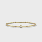 Single-Stone Slim Bangle rotating product video in yellow gold