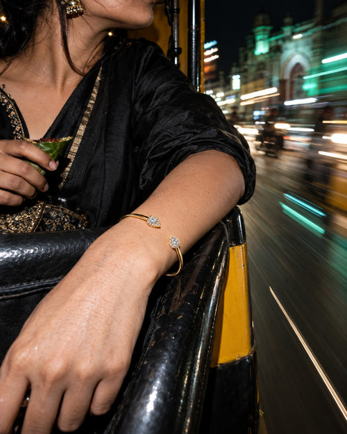 SENVIRRA pear cuff bracelet styled for an evening in the city